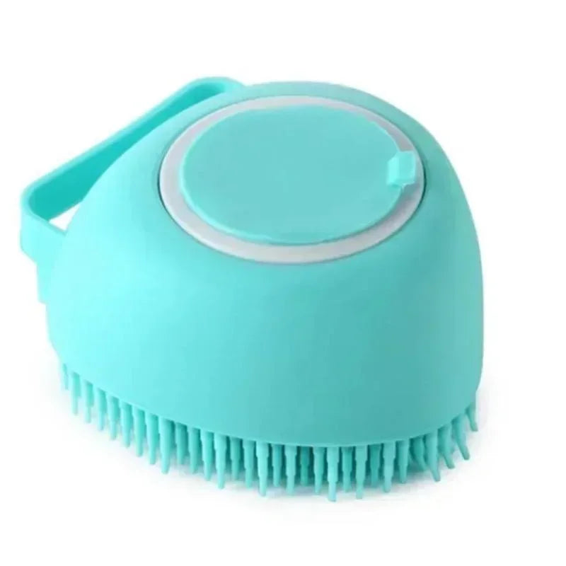 Turquoise silicone scrubber brush for pets 
with bristles on a white background