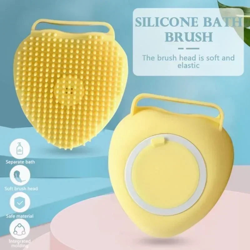 Yellow silicone bath brush with soft bristles on a blue background